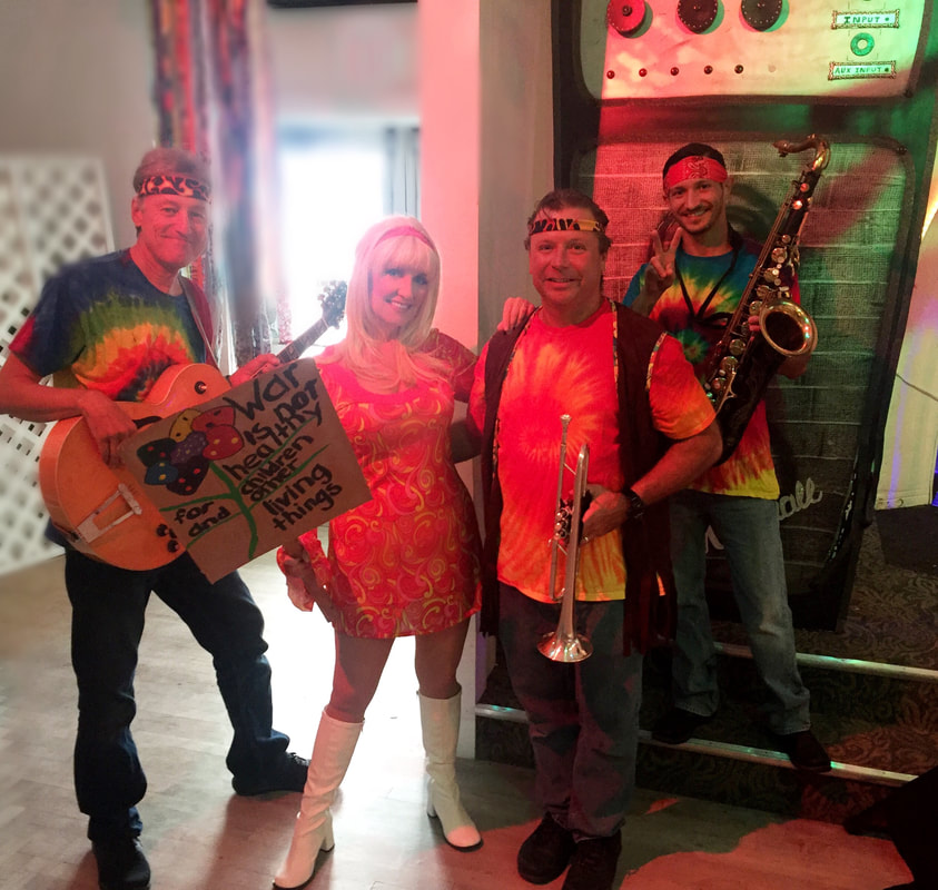 Throwback decades Band https://www.throwbackdecadesband.com/ 80s band serving Jacksonville, Amelia Island and Ponte Vedra Beach, Fl. 60s, 70s, theme cover band for Woodstock theme parties. 